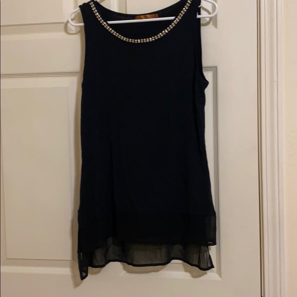 Dressy sleeveless top. Crystal embellishments